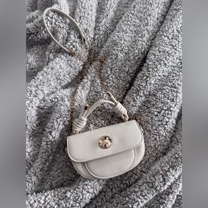 Elegant White Mini Handbag with Gold Accents